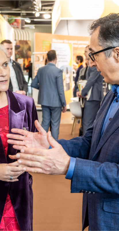 President of IFOAM - Organics International talking to the Minister of Food and Agriculture of Germany.